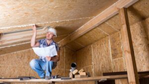 inspecting a house's attic